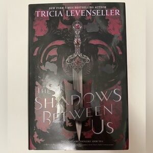 The Shadows Between Us by Tricia Levenseller Hardcover